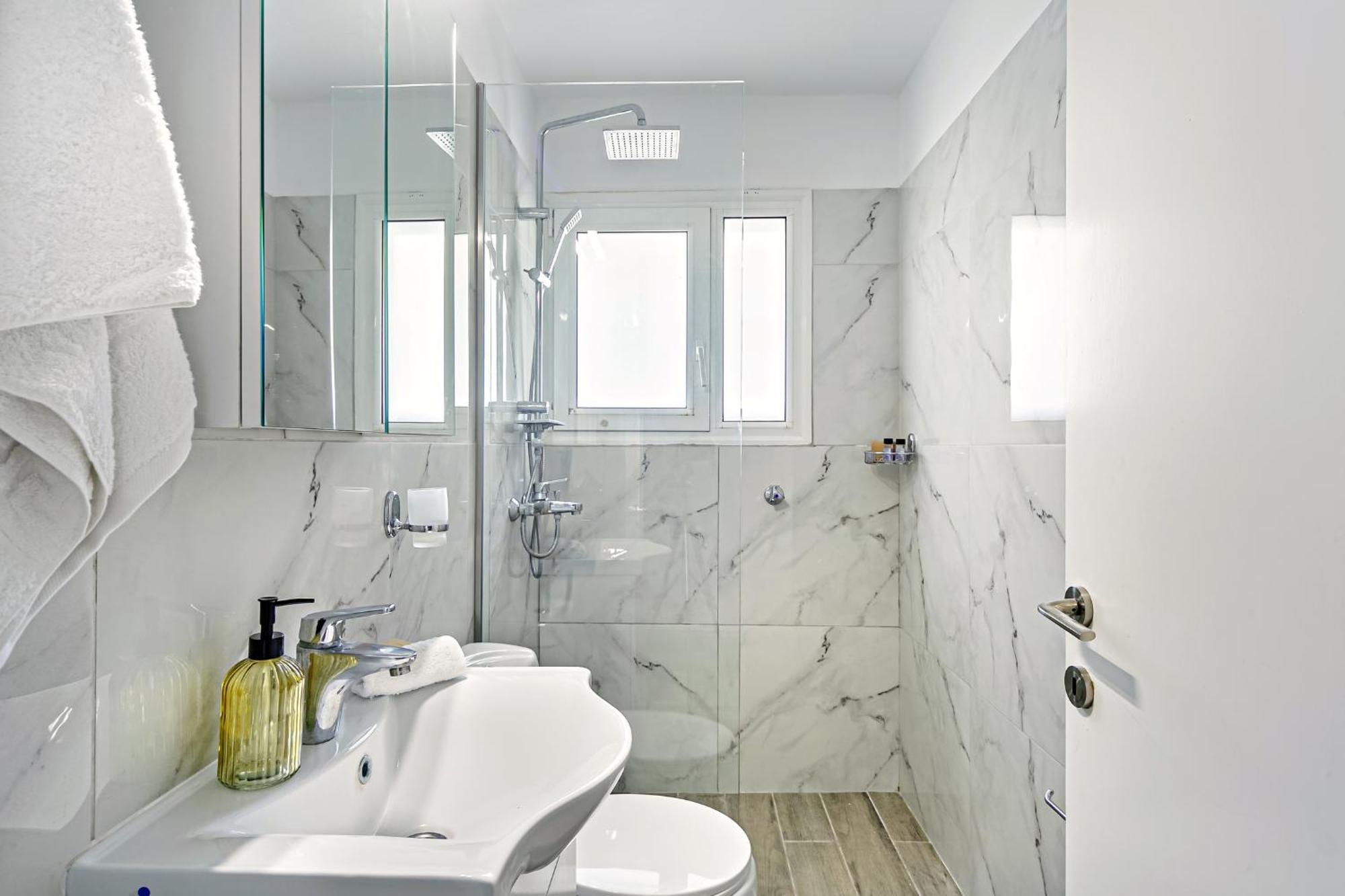 Nest Apartment Alepou Bagian luar foto